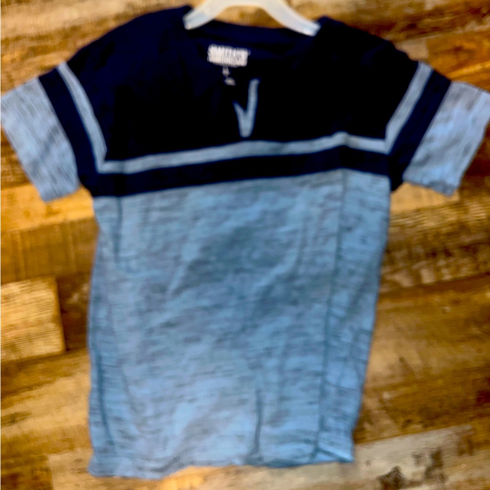 Boys size large (7), short sleeved T-shirt, blue and denim colored.